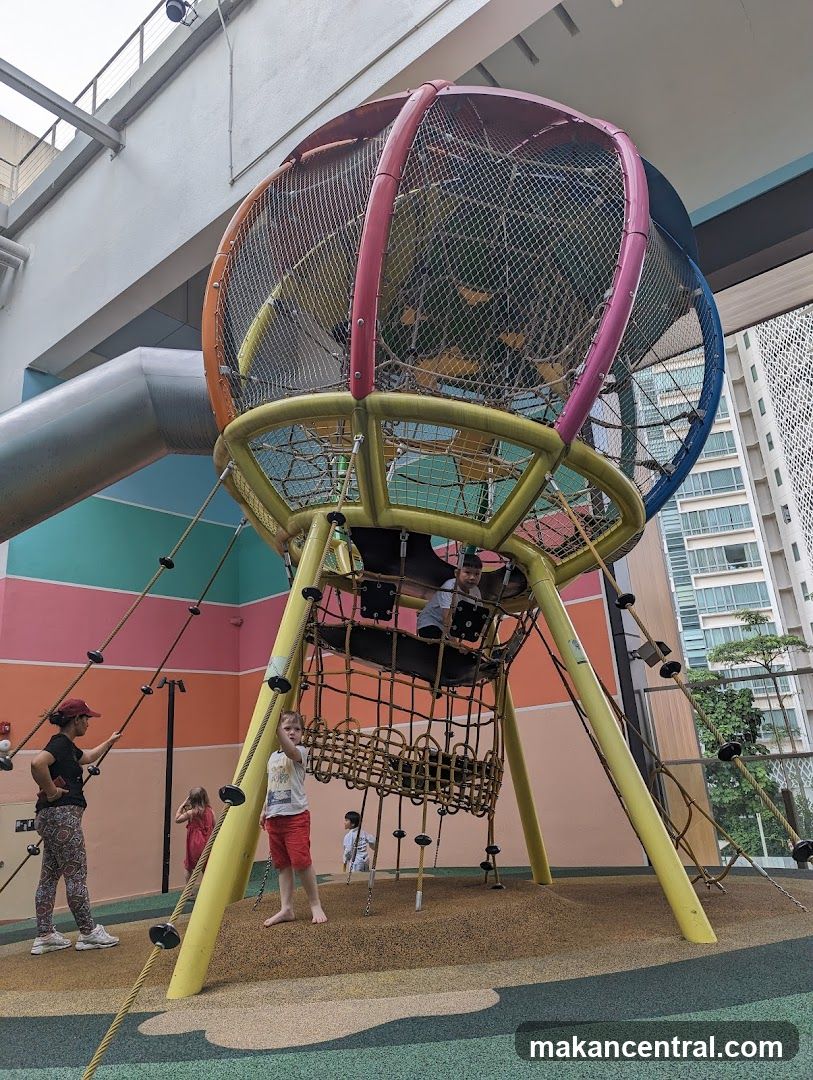 Children playing in a colorful indoor playground