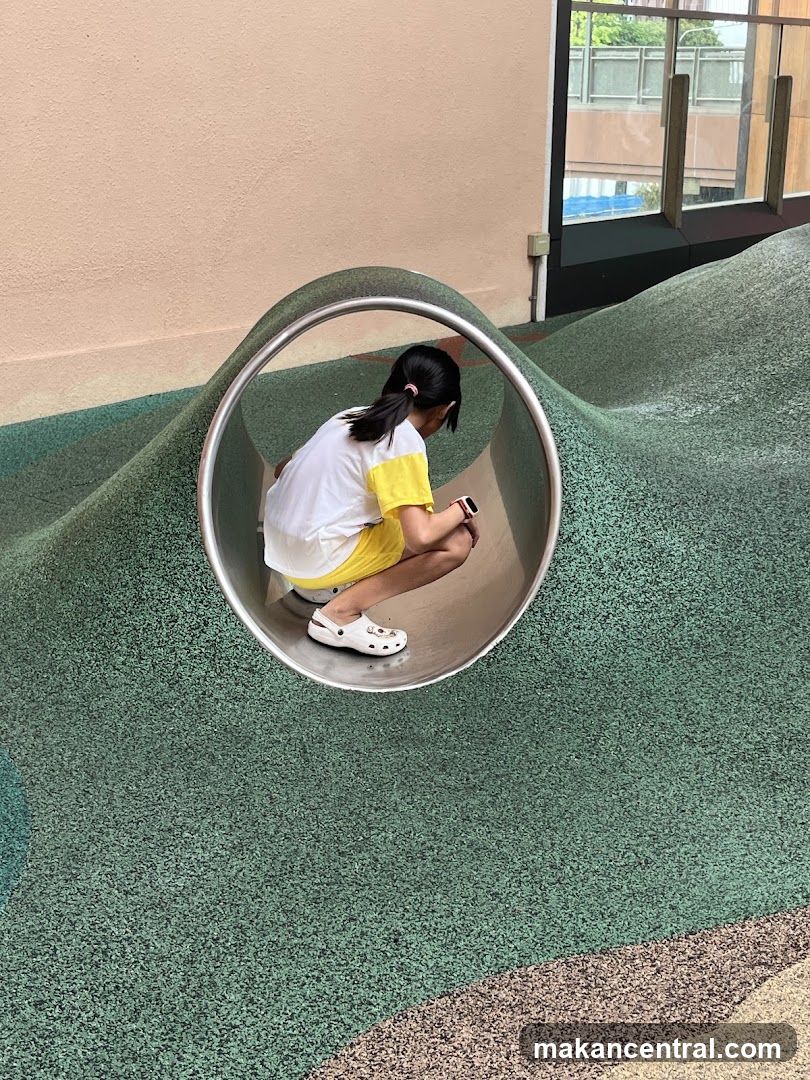 Child in a tunnel slide
