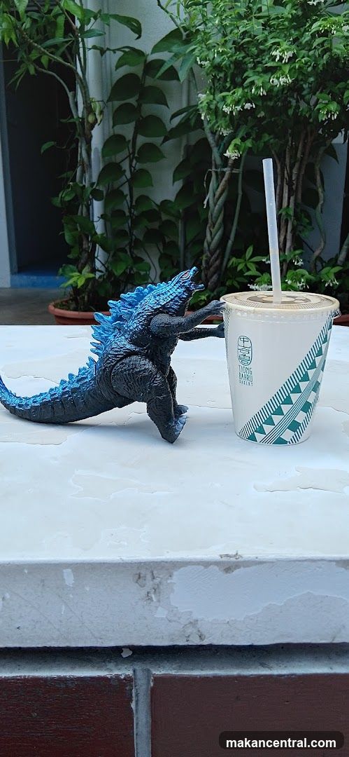 Godzilla with a drink