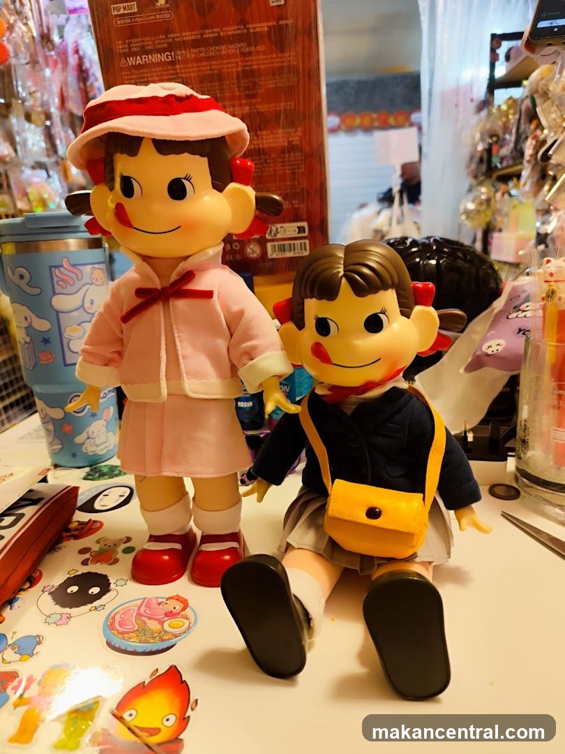Two dolls with stickers