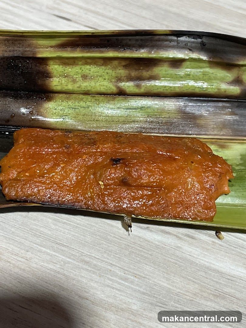Food item wrapped in leaves