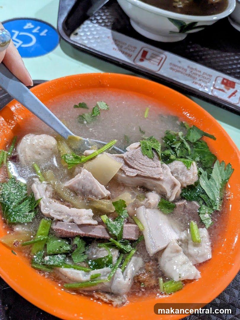 Bowl of Soup with Meat and Vegetables
