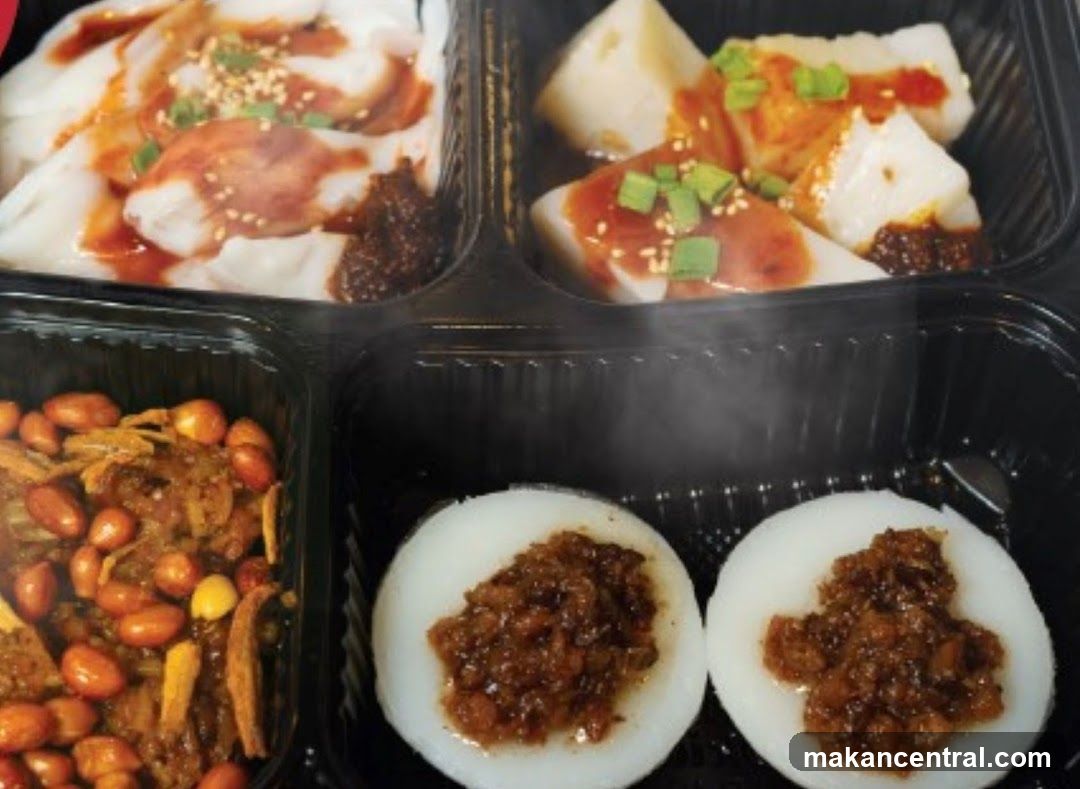 Four Compartment Takeout Container with Food