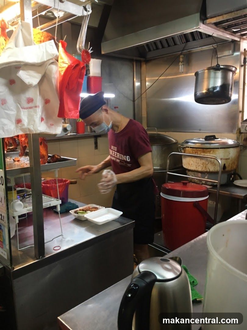 Food stall worker preparing a meal