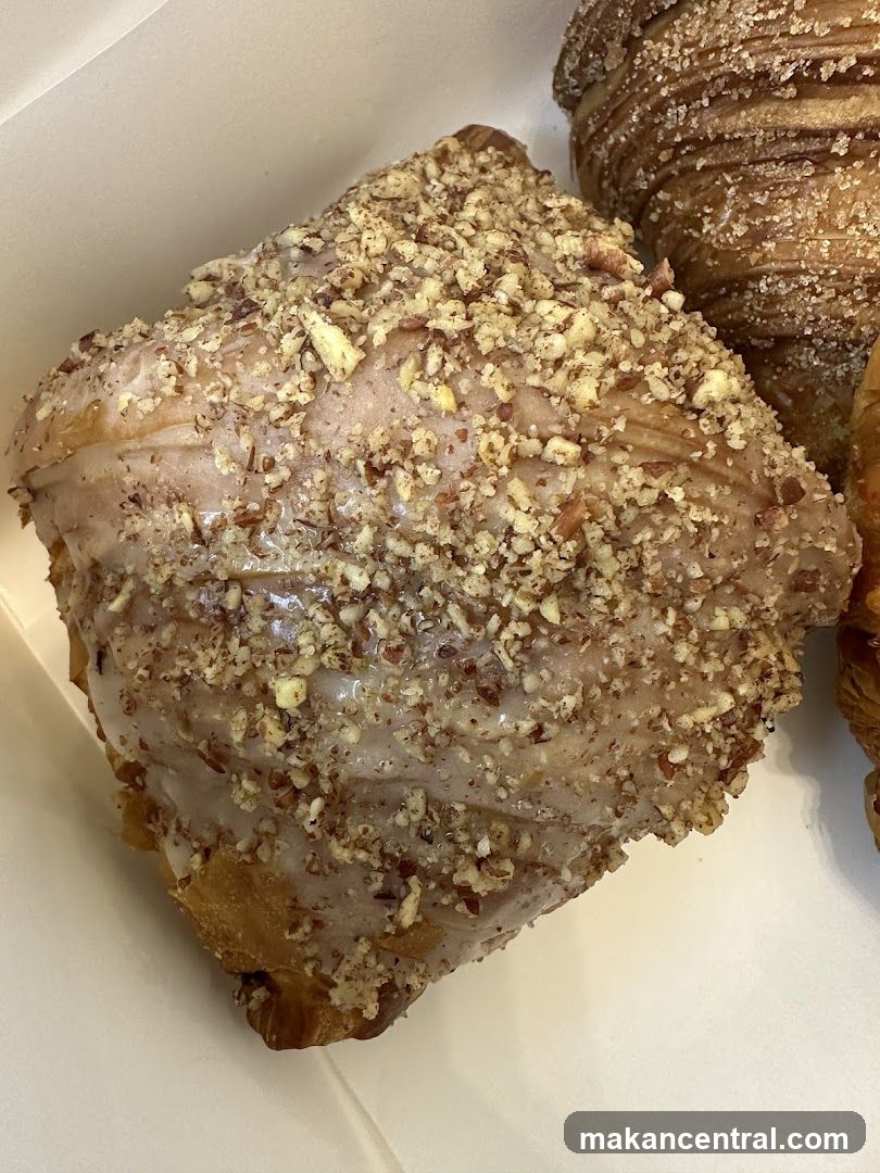 Croissant with Glaze and Nuts
