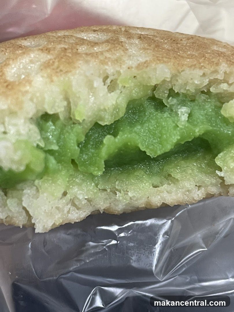 Close-up of a green-filled pastry