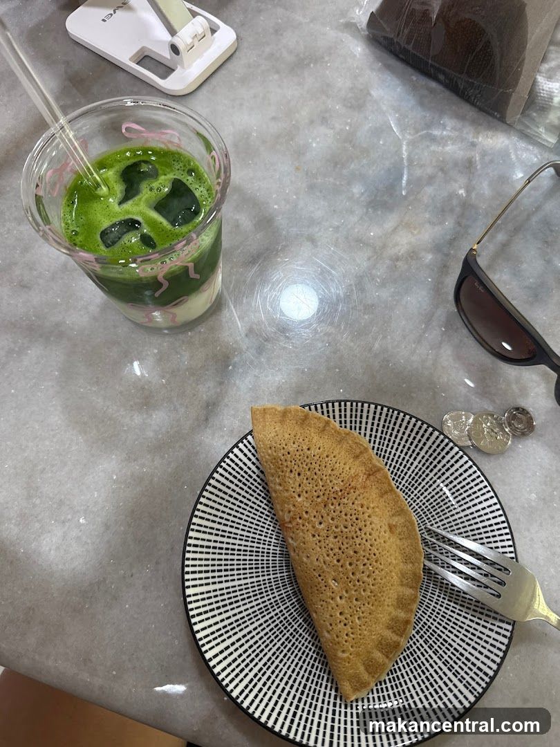 Matcha drink and crepe