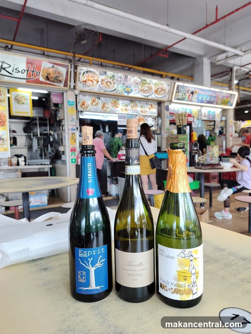 Three bottles of wine on a table