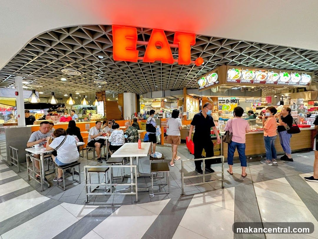 Food court with seating and food stalls