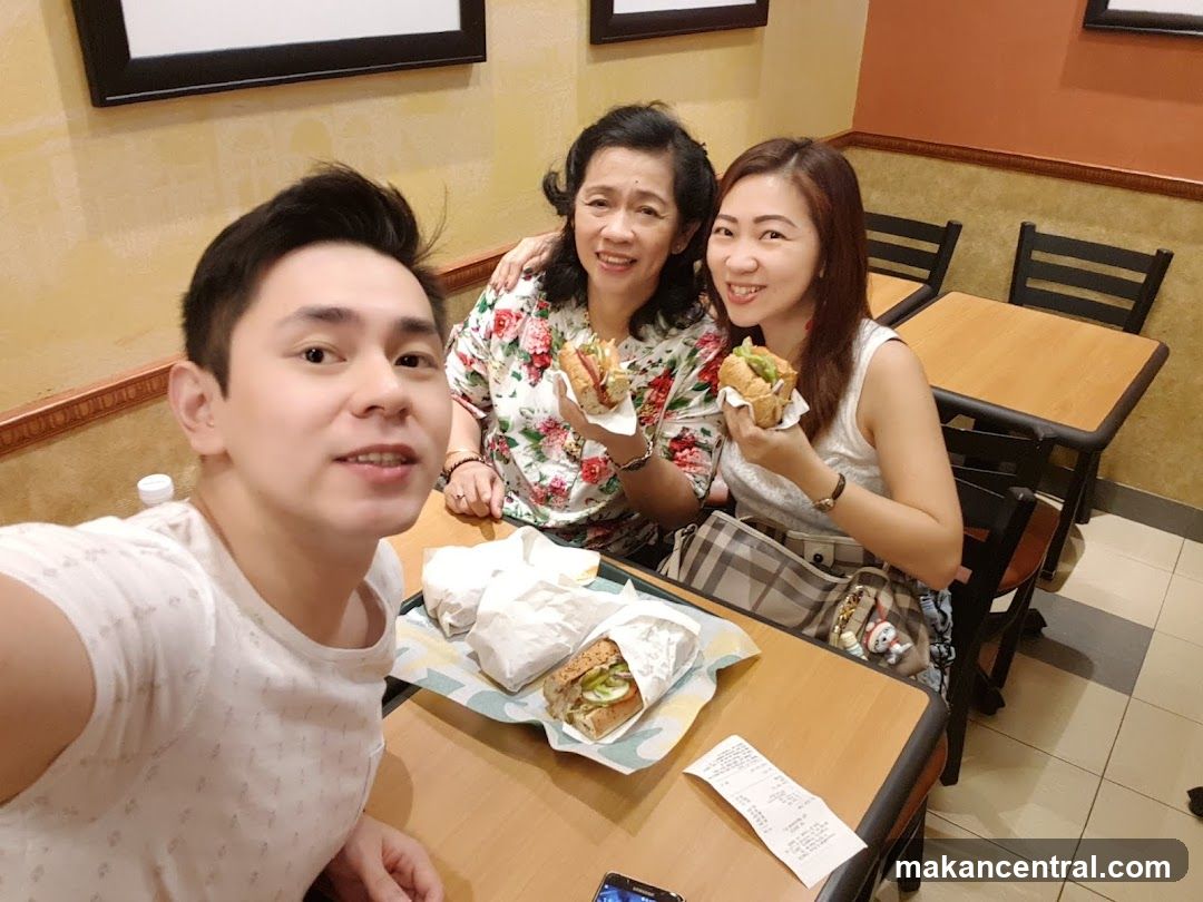 People eating sandwiches