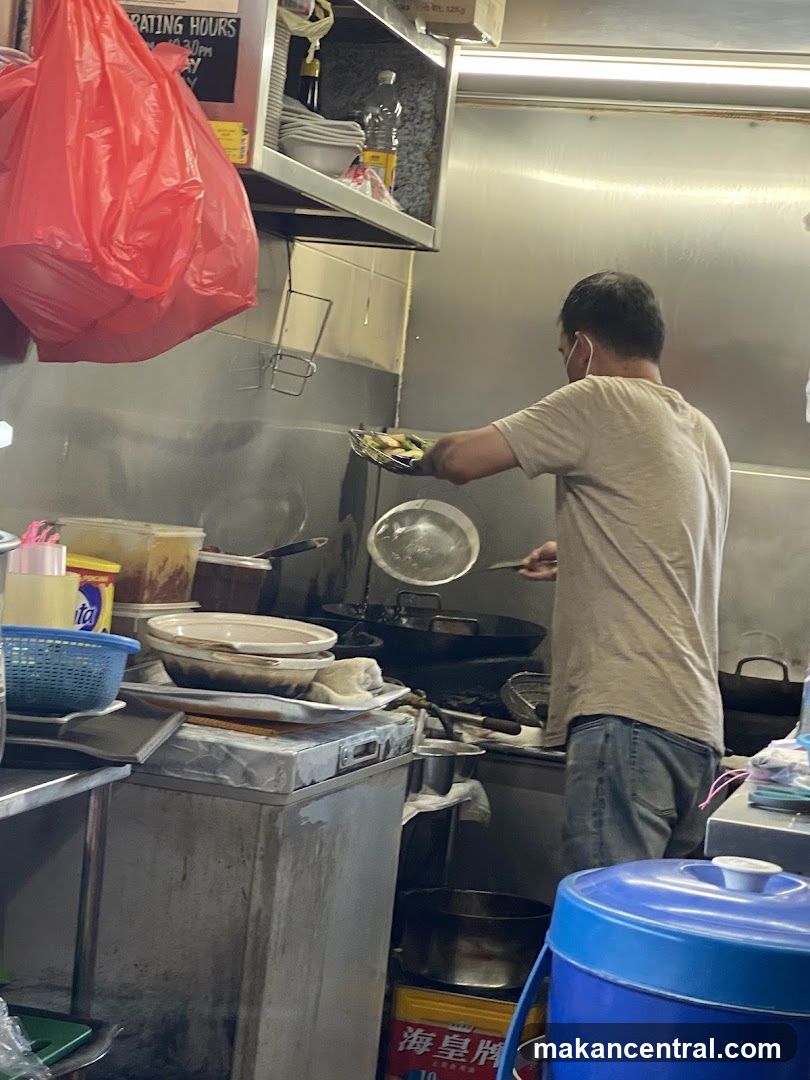 Cook preparing food in a kitchen