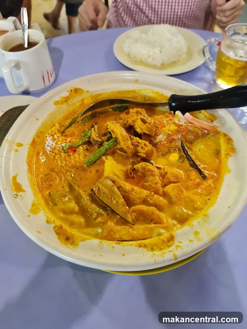 Curry Dish with Rice and Drink