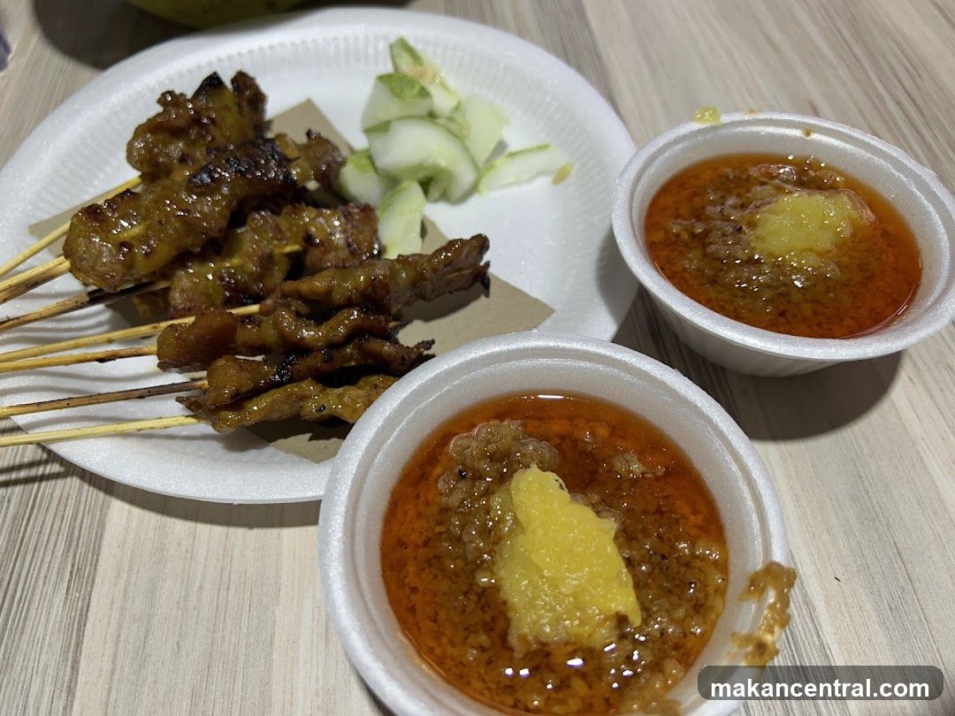 Satay with Peanut Sauce and Cucumber Slices