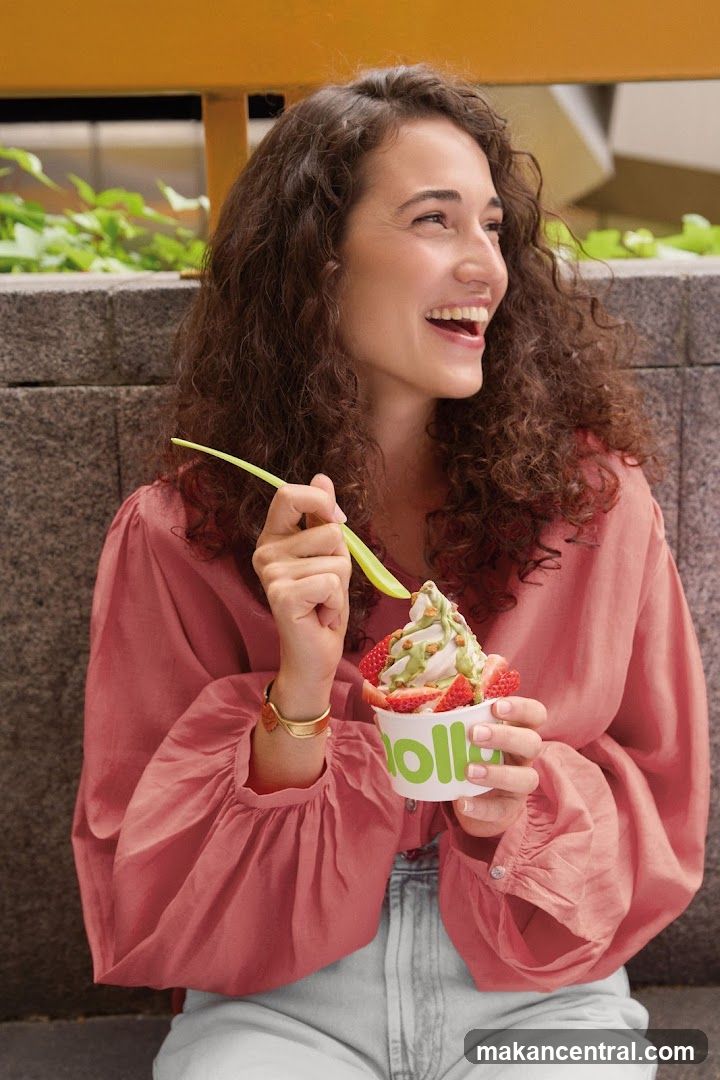 Woman eating frozen yogurt