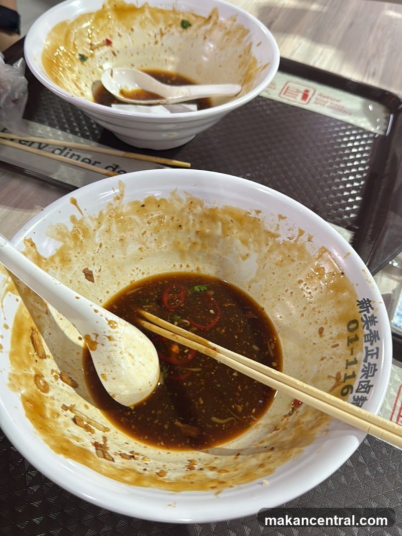 Dirty Bowls with Chopsticks and Spoon