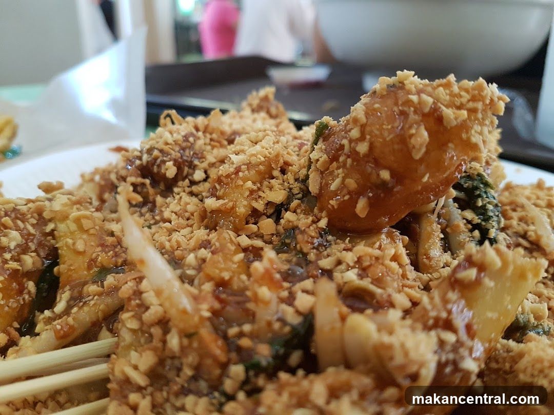 Close-up of a dish with chopped peanuts