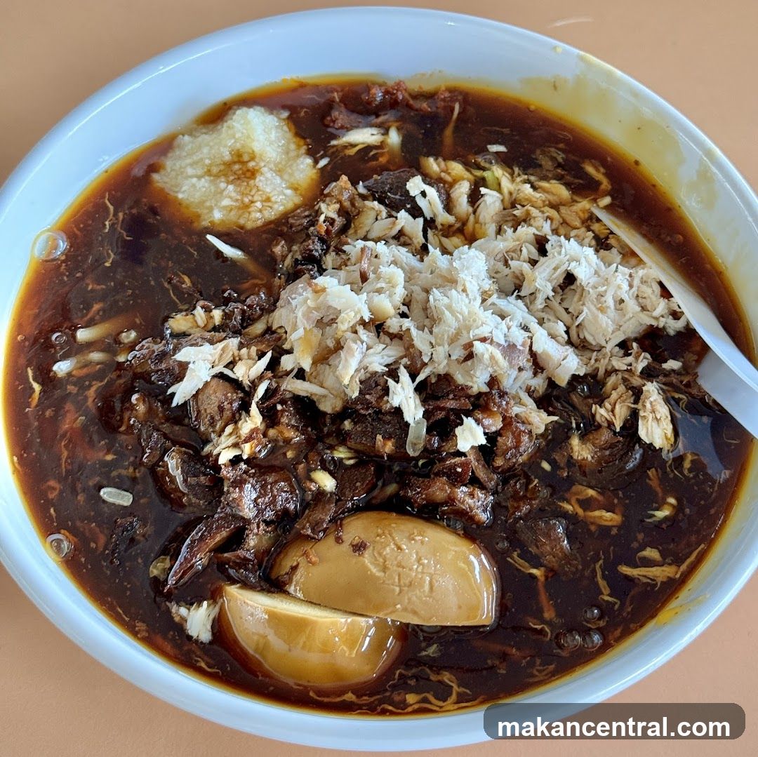 Bowl of Noodles with Egg and Shredded Meat