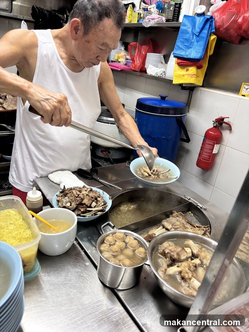 Man serving soup