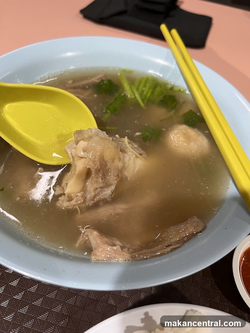 Bowl of Soup with Meat and Vegetables