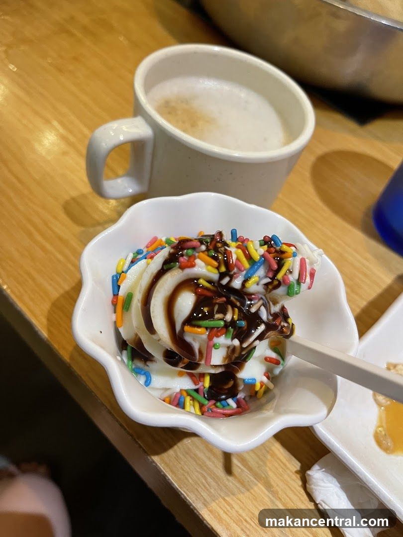 Soft Serve Ice Cream with Sprinkles and Chocolate Sauce
