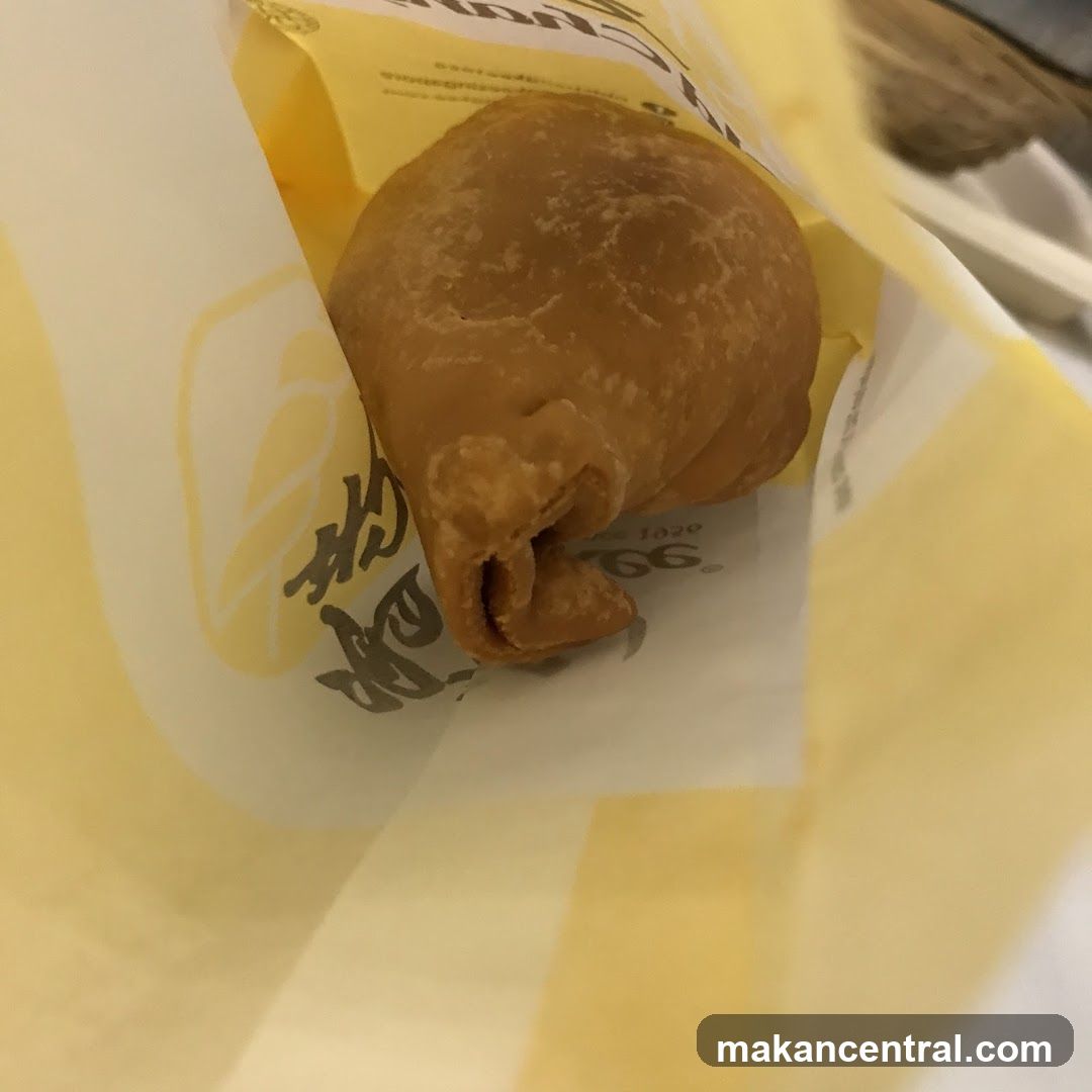 Fried pastry in a paper bag