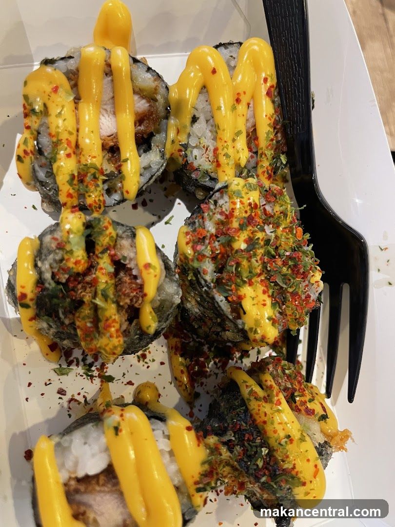 Fried Sushi Rolls with Cheese Drizzle