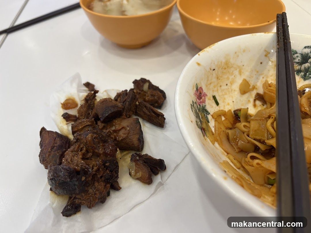Close-up of a meal with noodles and meat
