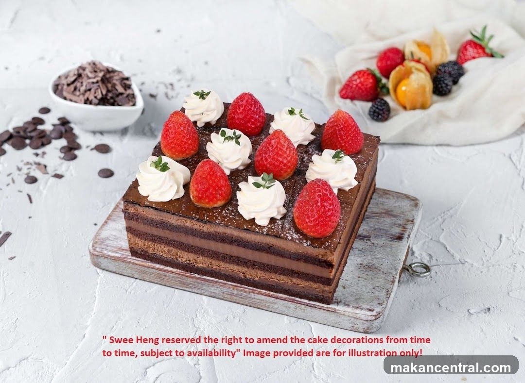 Chocolate cake with strawberries and cream