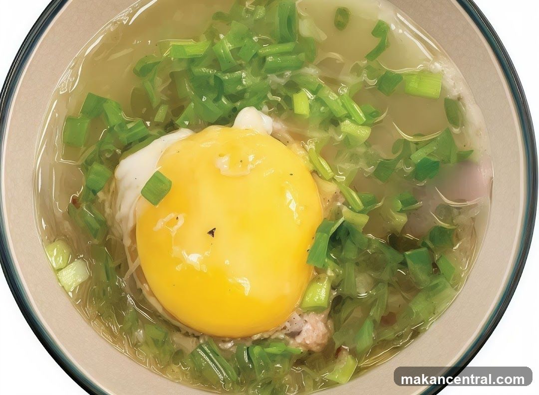 Bowl of Soup with Egg and Scallions