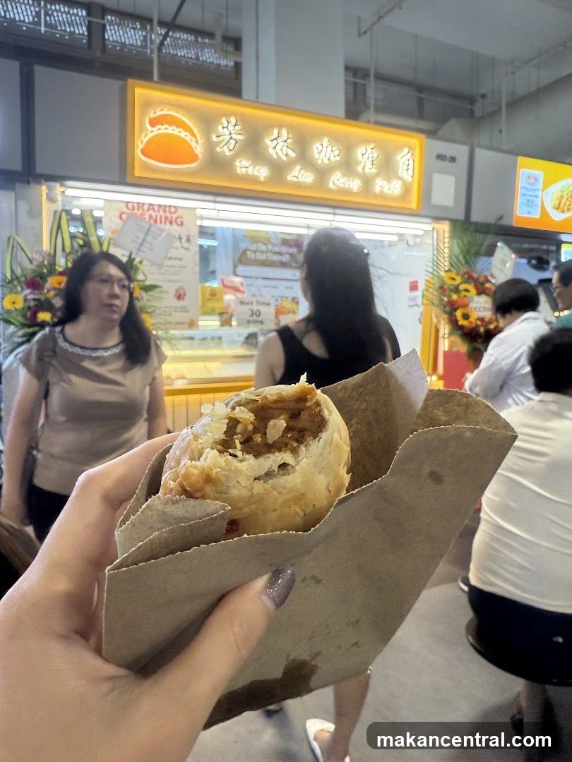 Person holding a pastry
