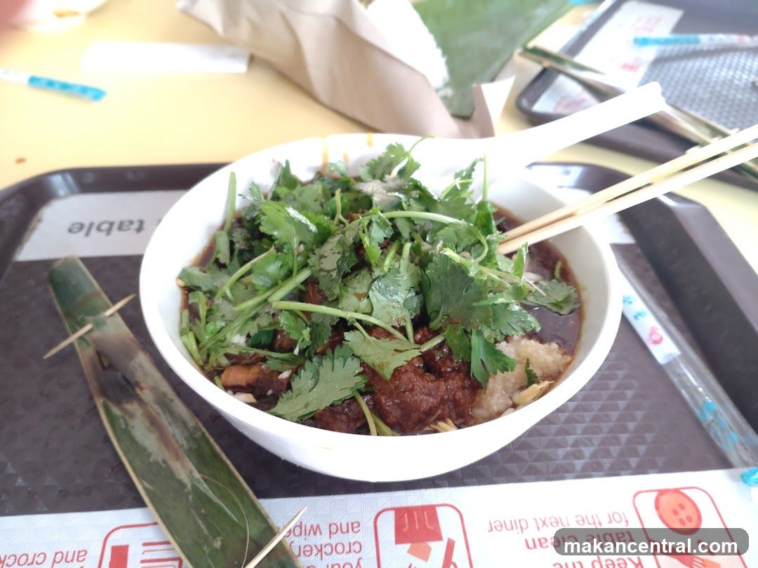 Bowl of food with chopsticks