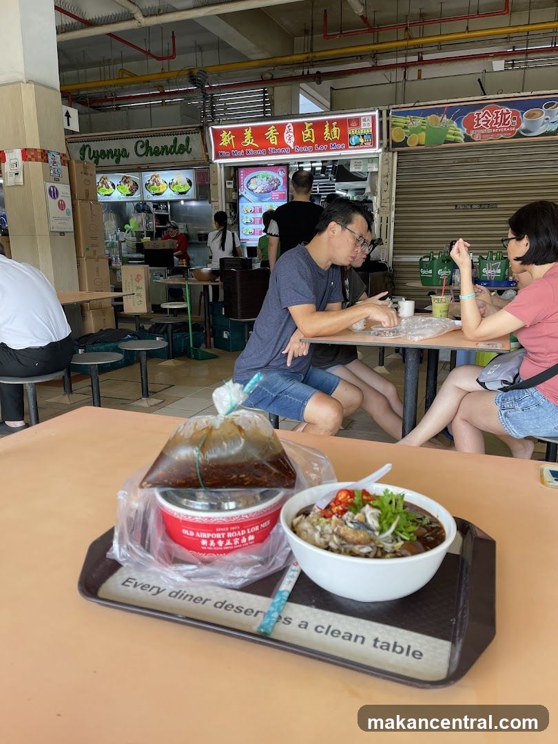 Food court scene with diners and food