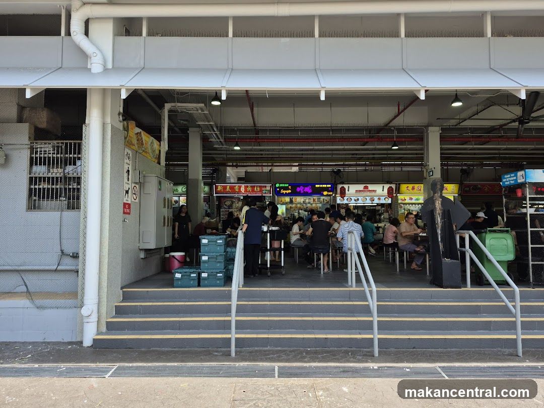 Hawker Centre with Food Stalls and Diners