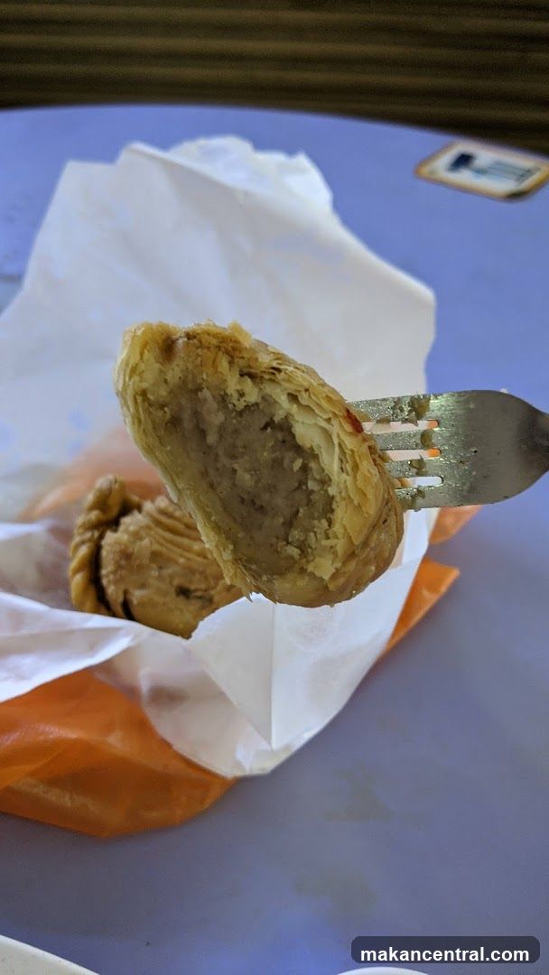 Curry Puff on Fork