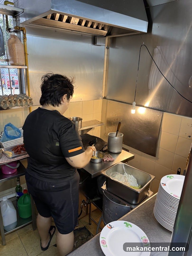 Cook preparing food in a commercial kitchen