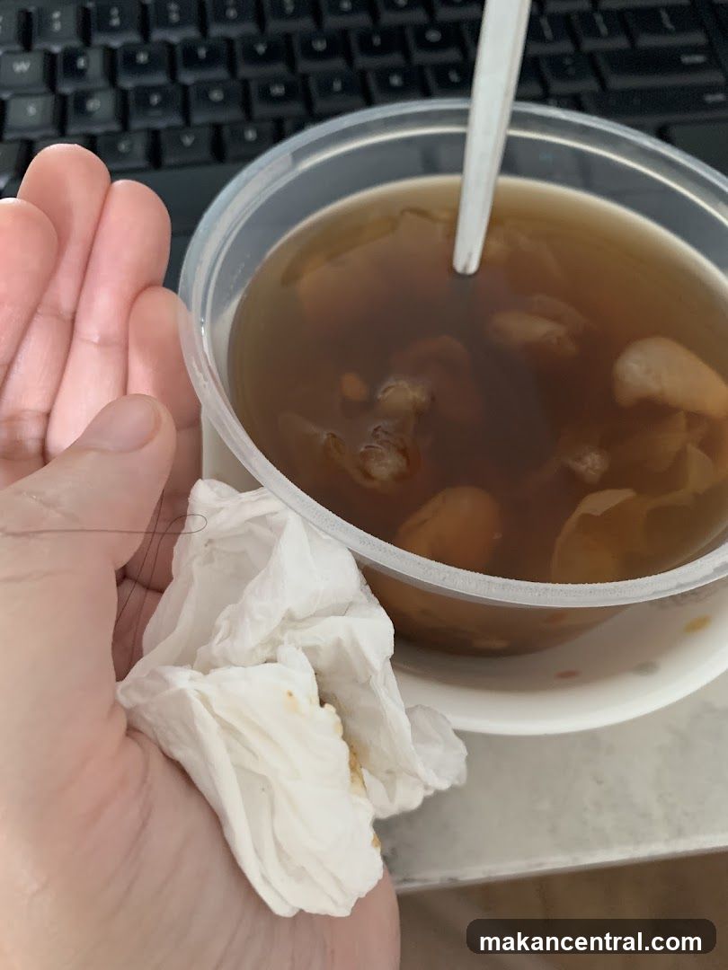 Soup with Spoon and Napkin