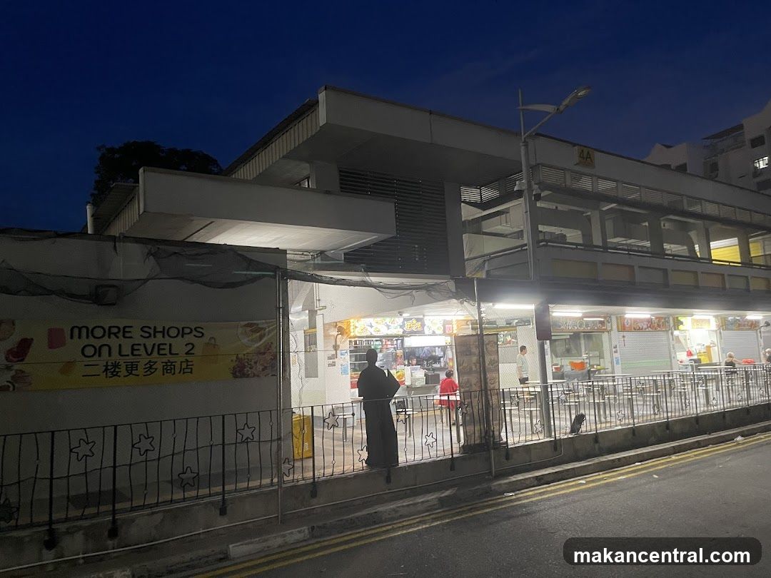 Food court exterior at dusk