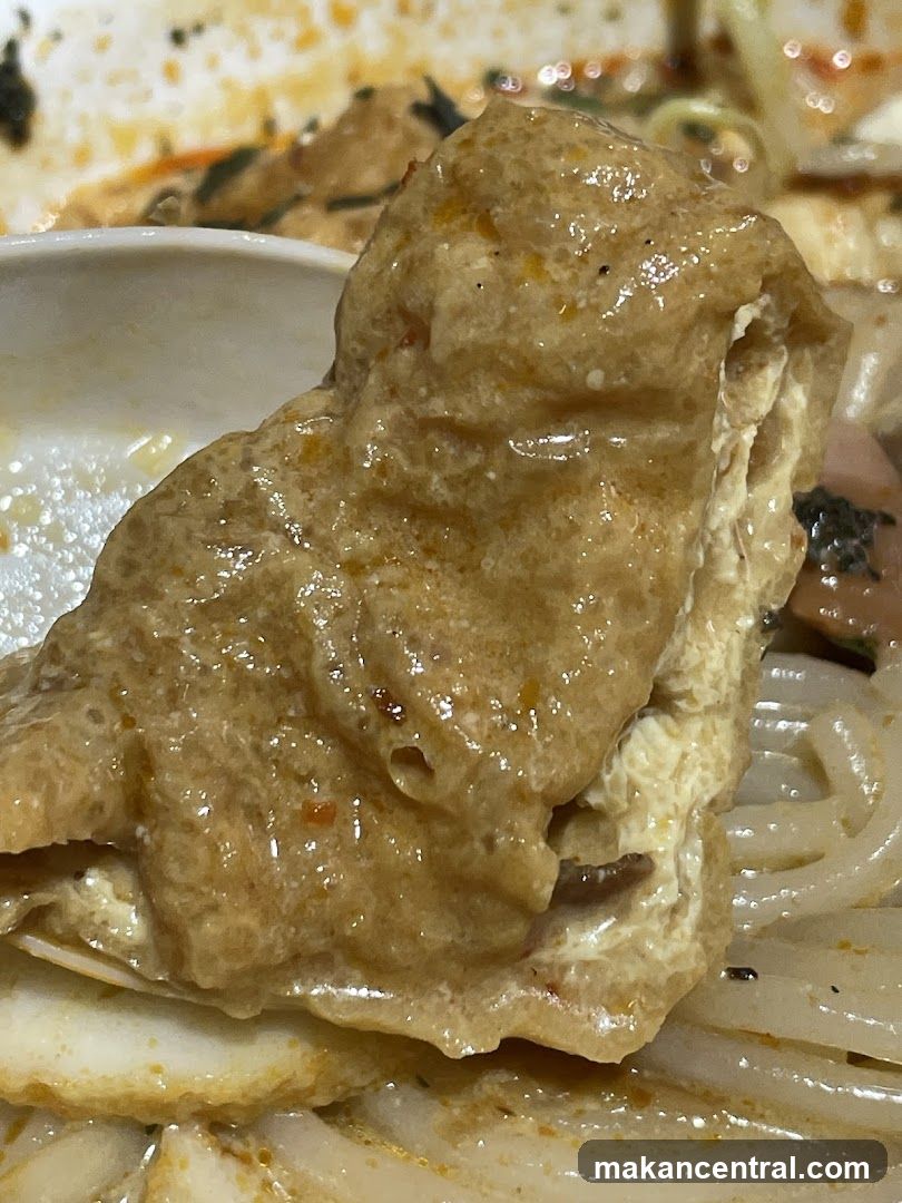 Close-up of Tofu Puff in Curry Noodles