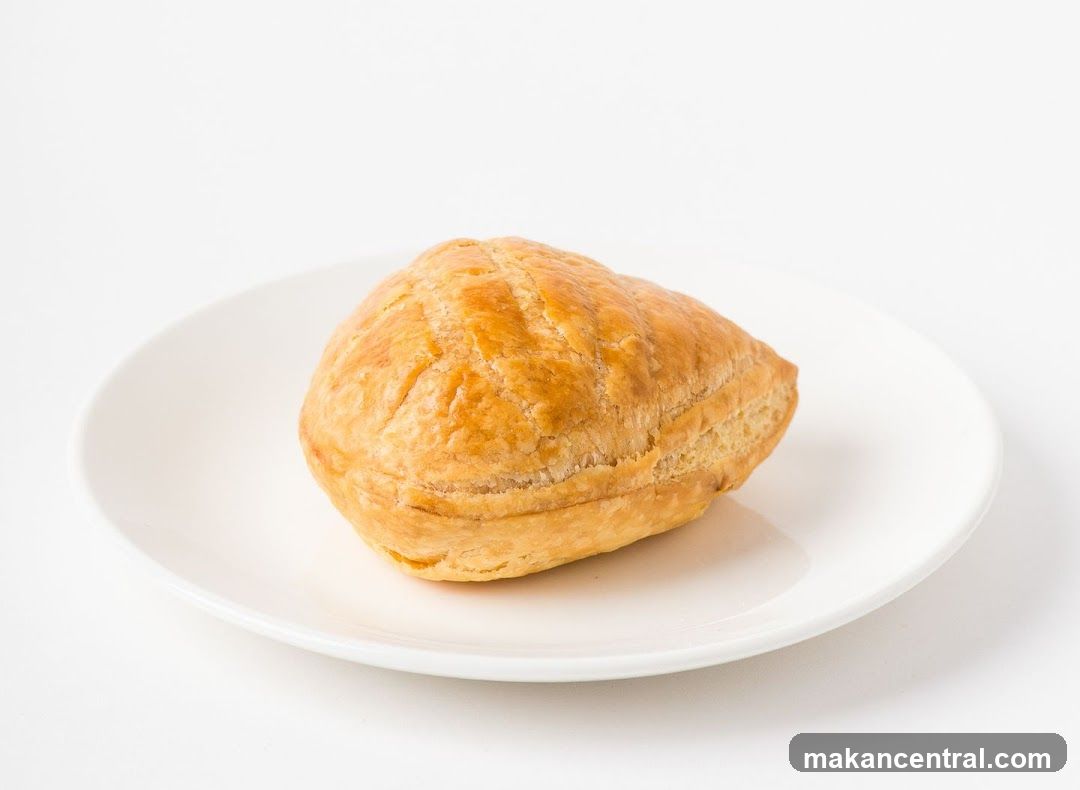 Golden Puff Pastry on a White Plate