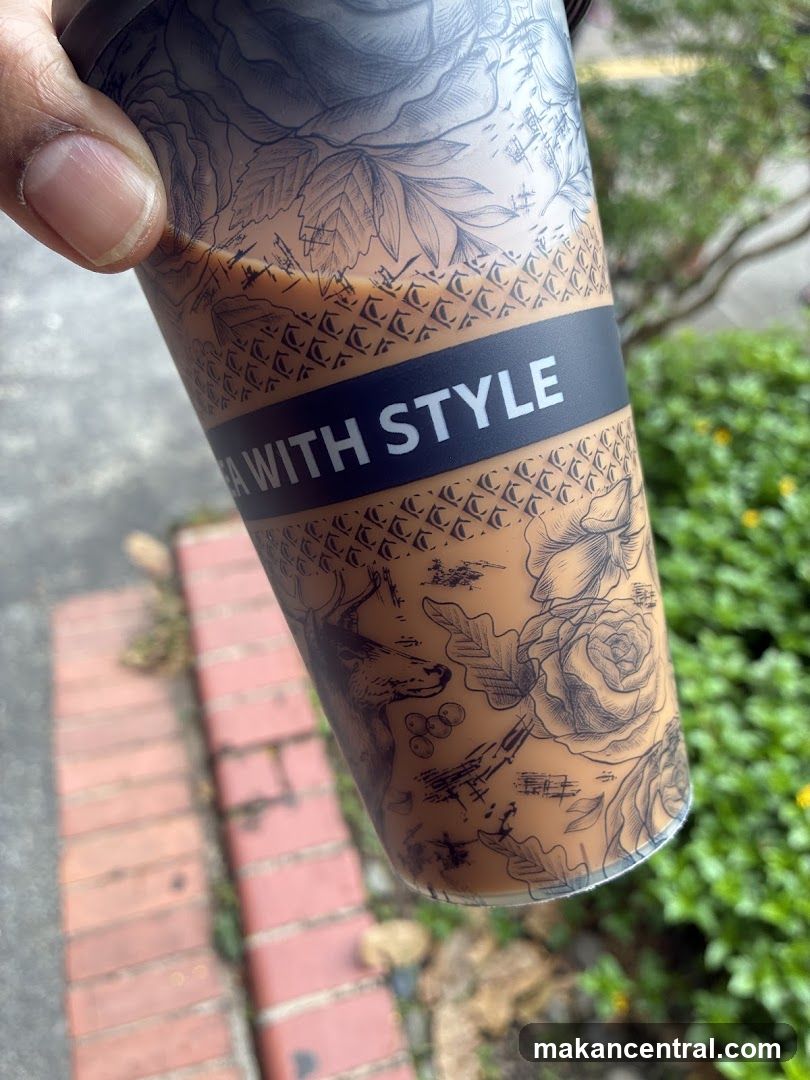 Beverage Cup with Floral and Animal Design