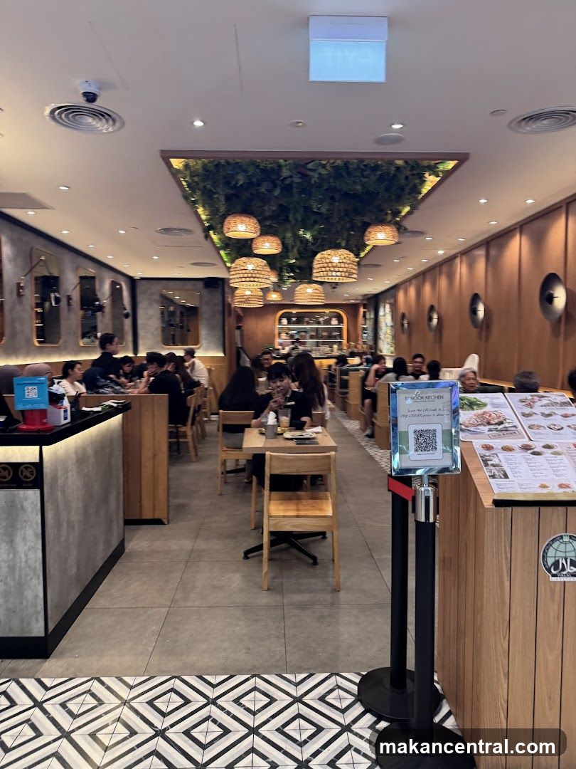 Restaurant Interior with Greenery and Woven Lamps