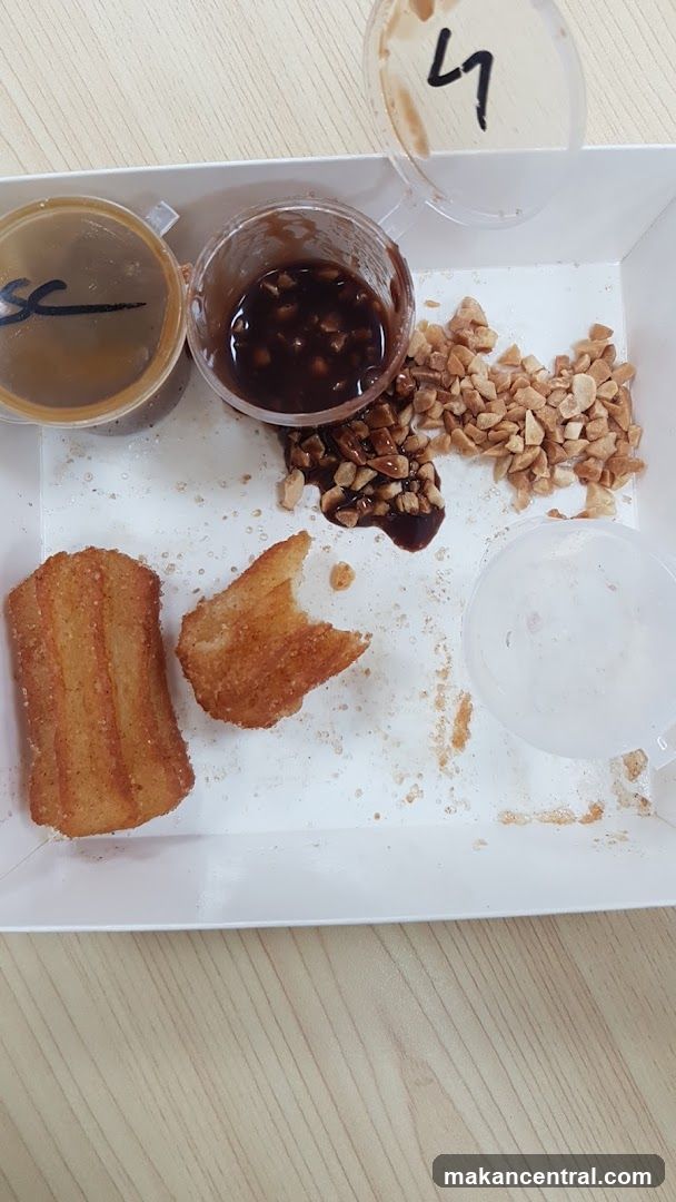 Churros with dips and toppings
