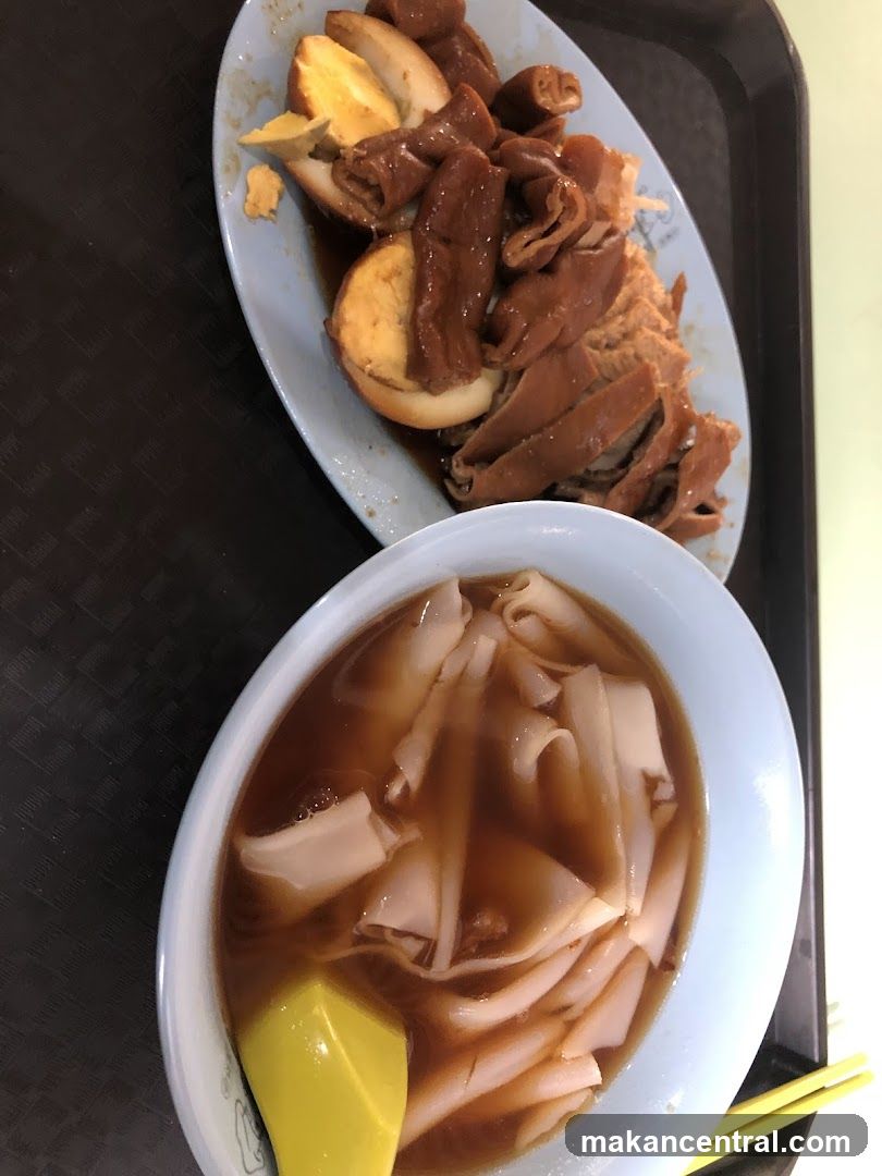 Braised Pork Intestines and Eggs with Noodles