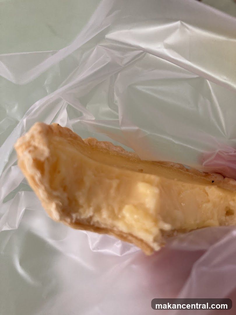Close-up of a slice of tart in plastic packaging