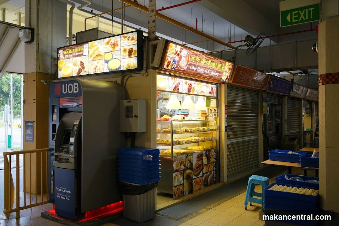 Bakery storefront with display cases and ATM