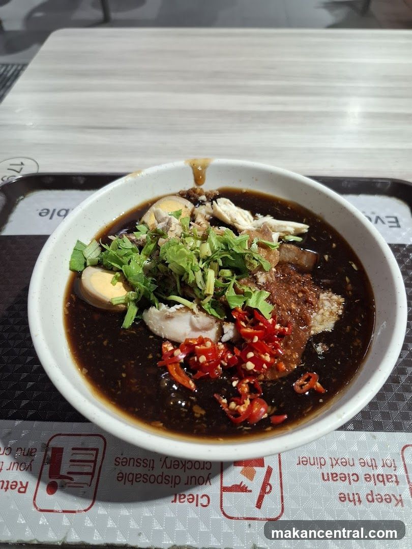 Bowl of noodles with meat and chili