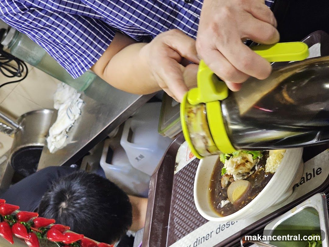 Sauce being poured onto food