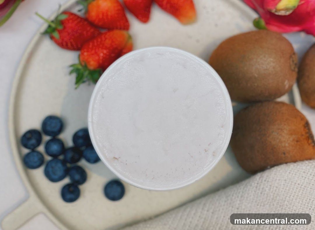 Cup of ice cream with fruit