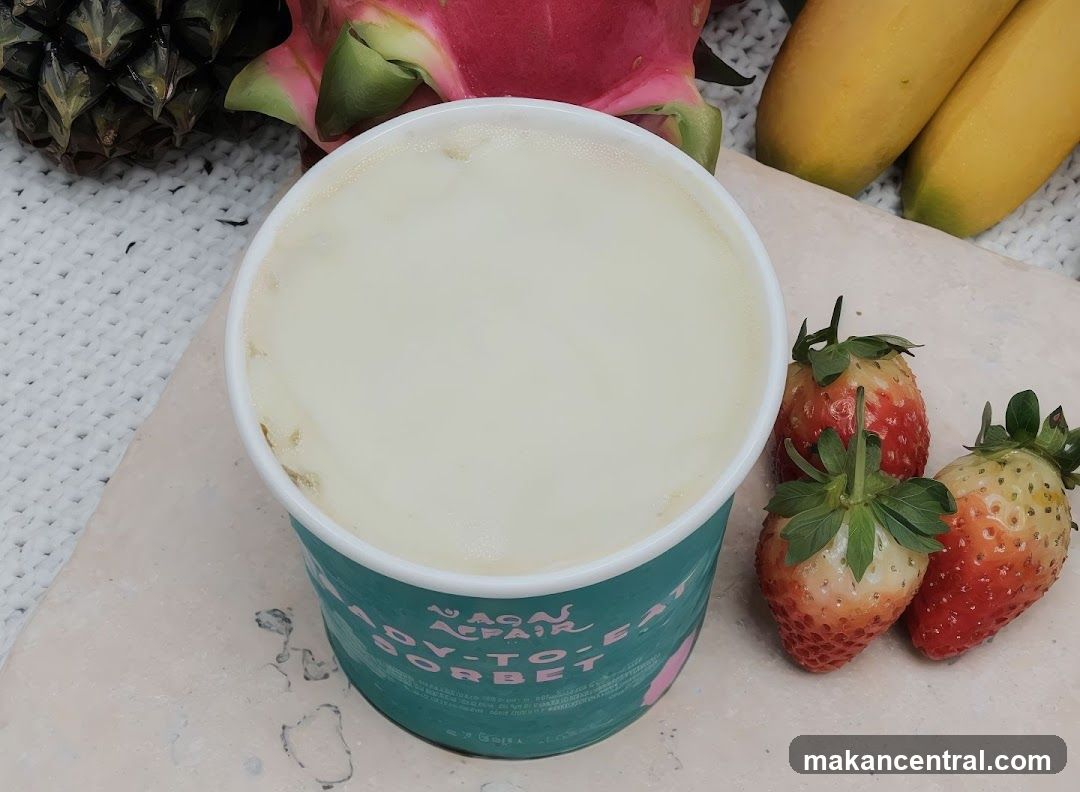 A cup of sorbet with fruit