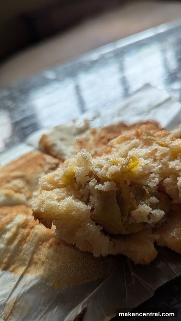 Close-up of a pastry with a hair